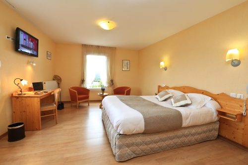 Chambre spacieuse avec coin salon